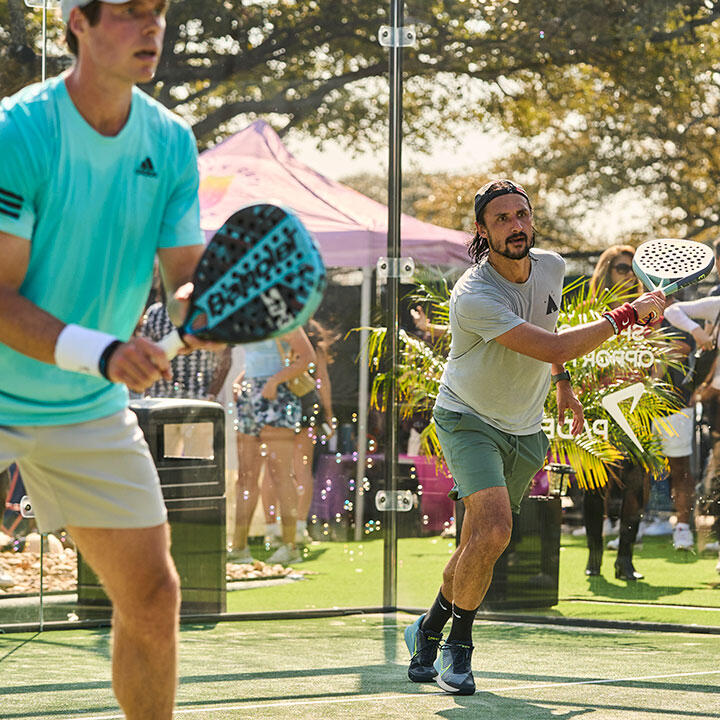 Two male players on court at Padel39.