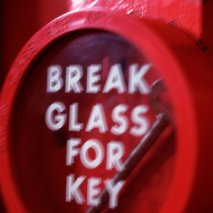 SKELA Image of a break-glass key metaphor.